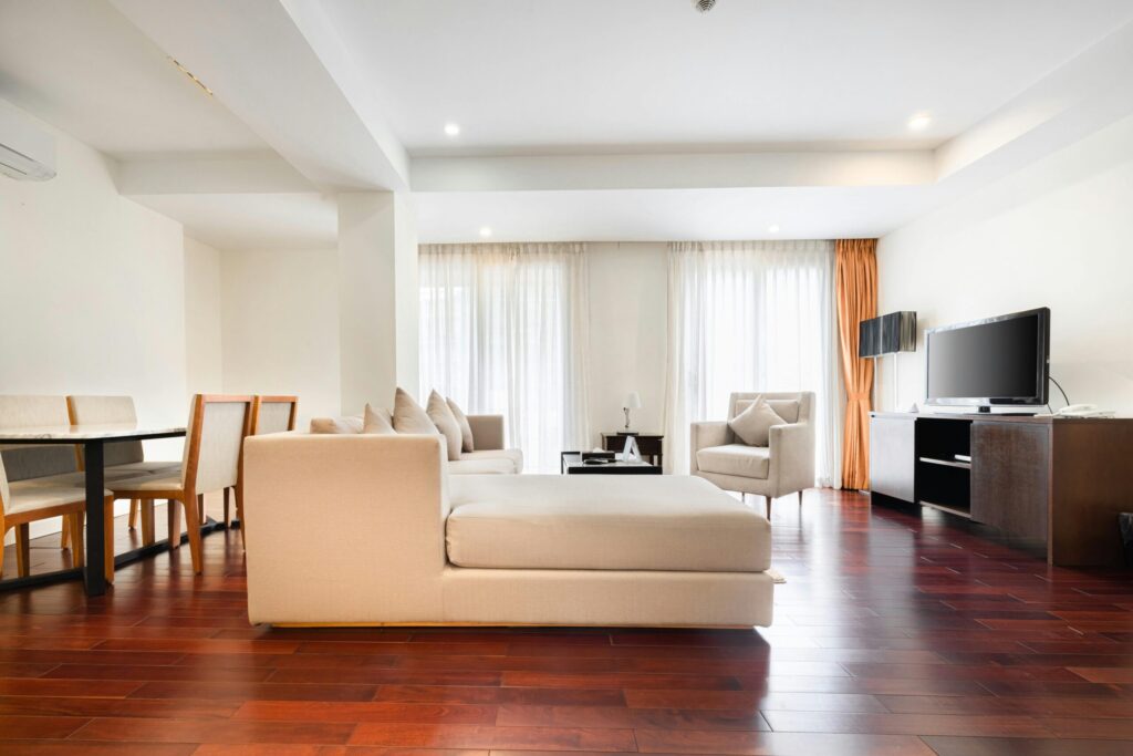 Elegant and airy living room with modern furniture and natural light.